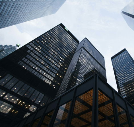 low-angle-photo-of-city-high-rise-buildings-during-daytime.jpg low angle photo of city high rise buildings during daytime